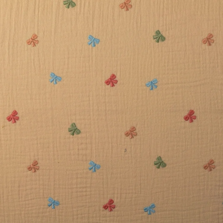 Baumwoll Musselin Stickerei Schleife, beige