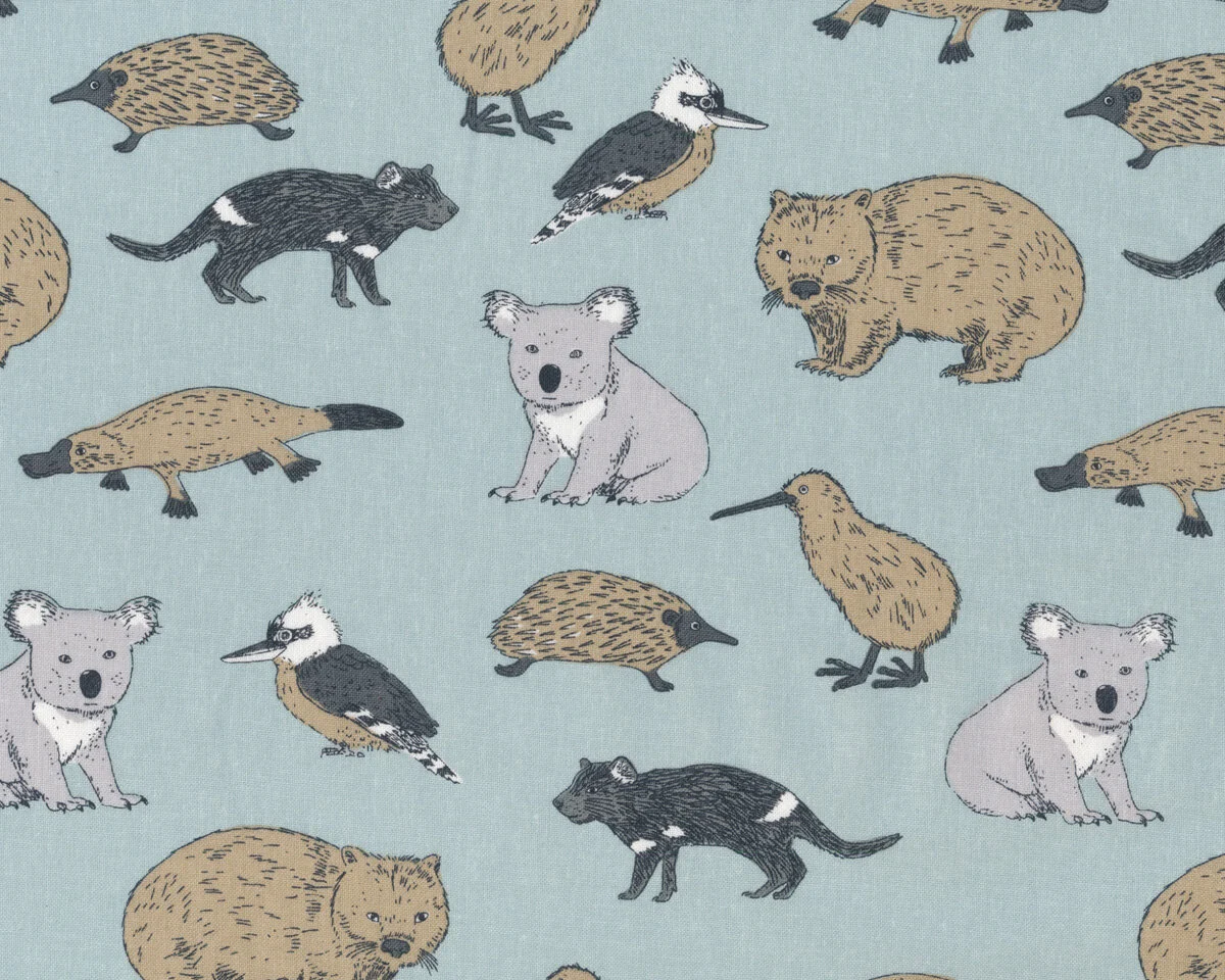 Baumwollstoff AUSSIES, australische Tiere, hellblau-helles schlammbraun