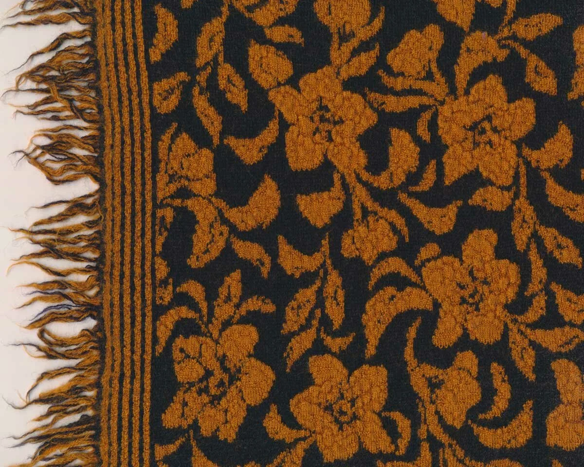 Merino-Strickjacquardstoff CLOQUE, Blumen, goldbraun-schwarz, Toptex