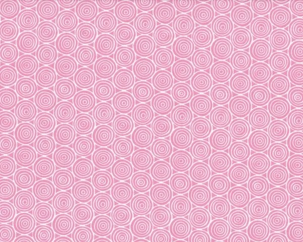 Patchworkstoff "Garden Spiral" mit Muster aus Kreisringen, rosa-weiß